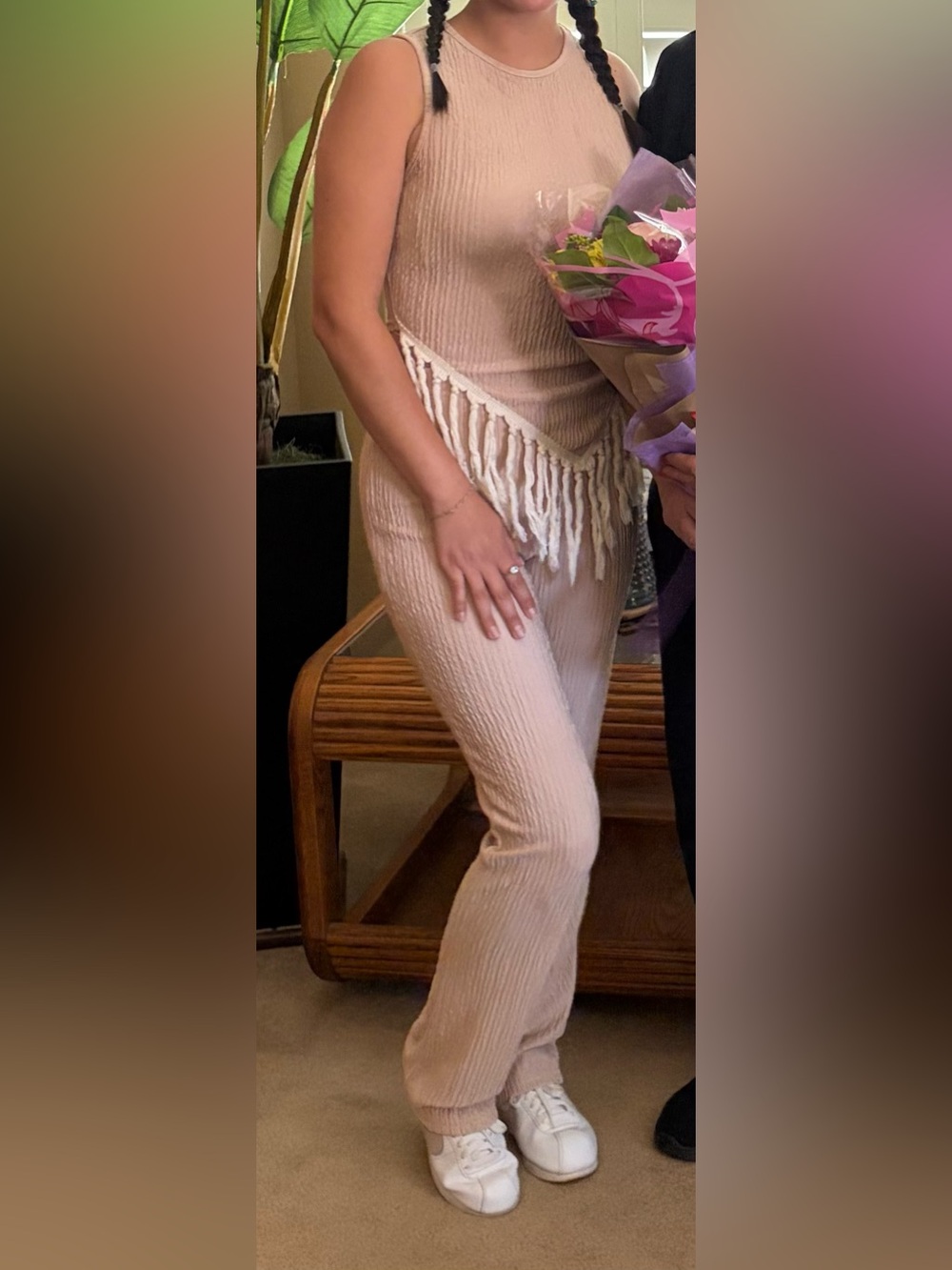 Sleeveless two-piece ribbed knit pant set with an asymmetric fringe hem in Blush